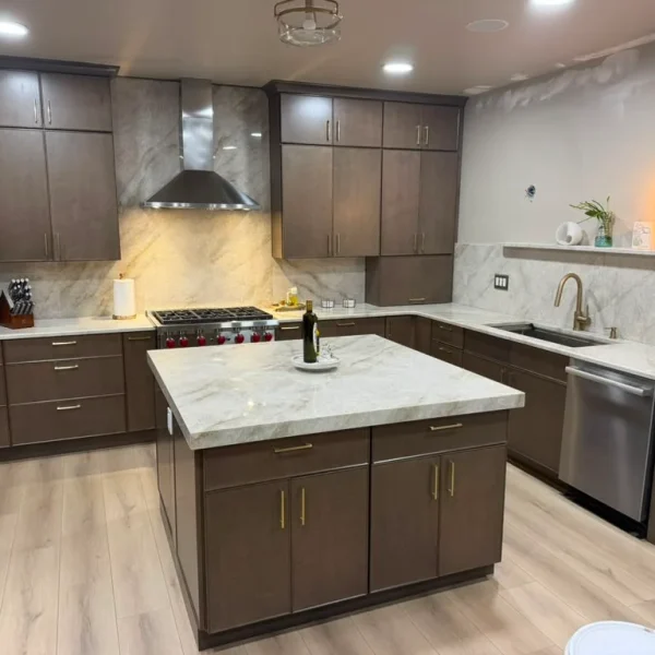 Kitchen renovation in Manalapan with custom cabinets and island by HM Cabinetry